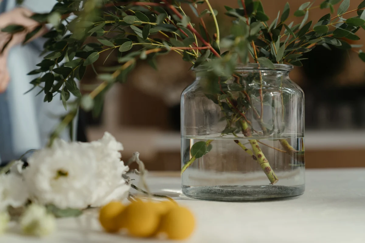 branches glass vase fall foliage - Cozy Fall Home Decor Ideas - Cozyner