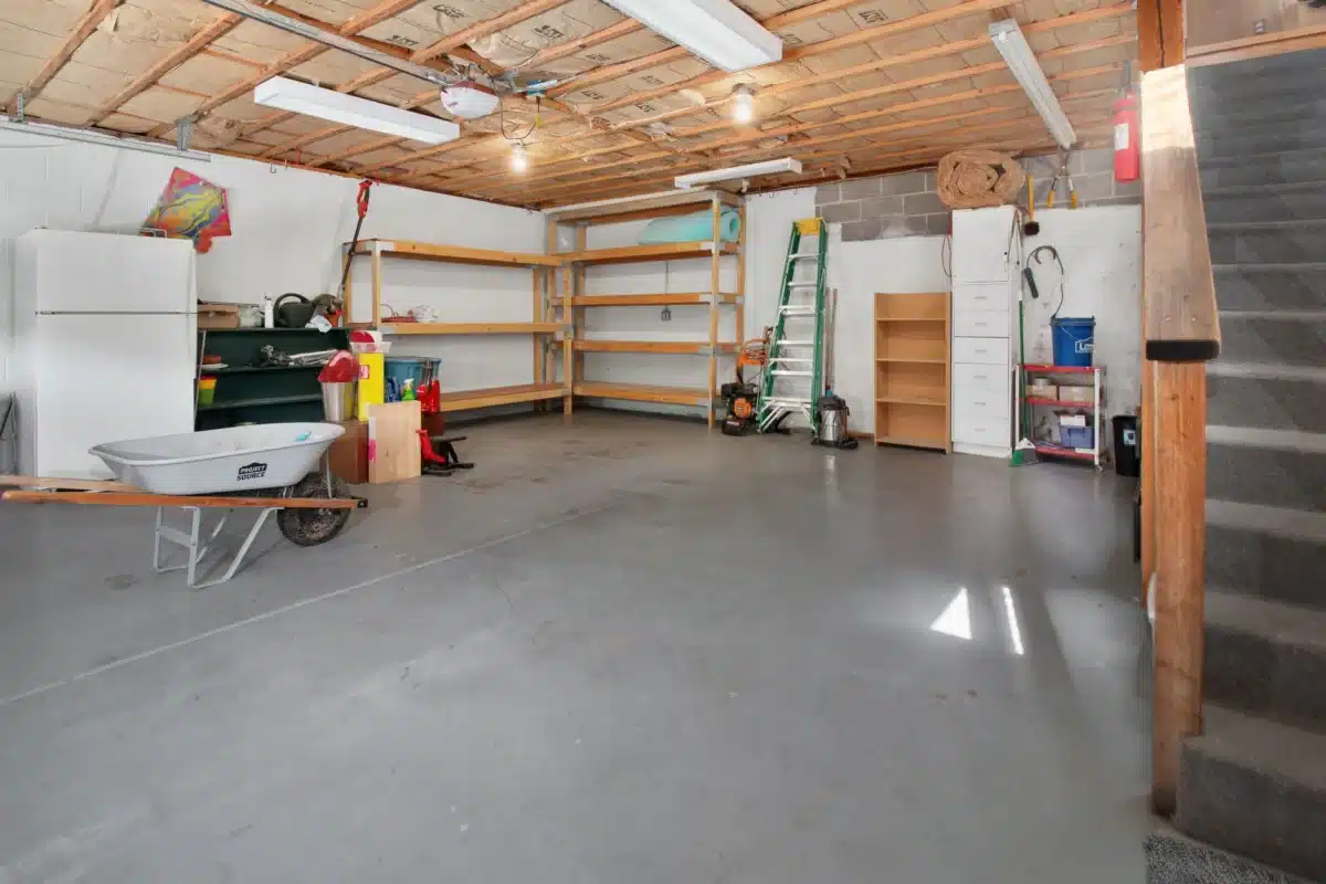 Organized garage with pegboard wall storage and pegboard-mounted tools